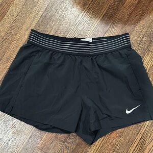 Nike Women's Black Athletic Shorts with White Logo